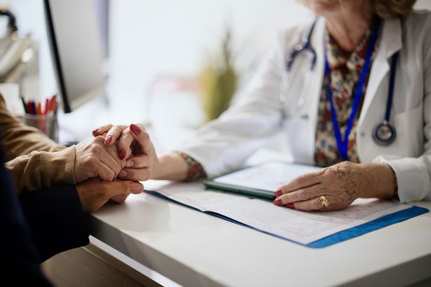 A woman in consultation with her doctor